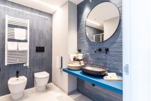a bathroom with a sink and a mirror at Feudo Antico in Tollo +38 photos