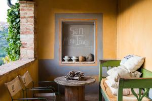 a table and chairs in a room with a table at Agriturismo San Martino in Montepulciano