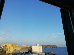 a view of the ocean from a window at Casetta Calanave in Ventotene