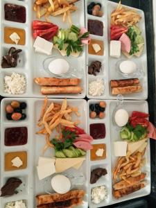 a lunch box filled with different types of food at Blue class otel in Atakum