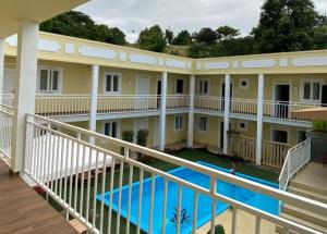 an aerial view of a building with a swimming pool at Hotel PZero in São Tomé +39 photos