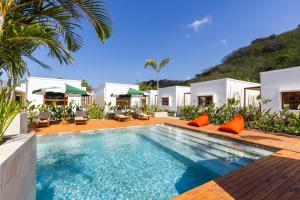 an image of a swimming pool at a villa at Alcazaba Resort Lombok in Kuta Lombok