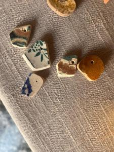 a group of cookies sitting on top of a couch at Clinica apartments in Bologna