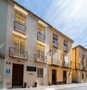 a building with balconies on the side of it at La Siesta de Picasso in Málaga