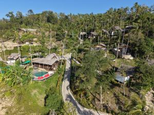 an aerial view of a resort in the jungle at RoomQuest THEVA Resort Residence Koh Samui in Koh Samui