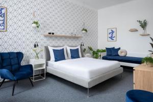 Postel nebo postele na pokoji v ubytování Hotel Riverside by goodnite cz
