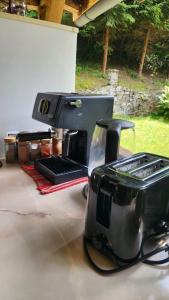 a toaster sitting on top of a table at Cabana Pinolera in Boga
