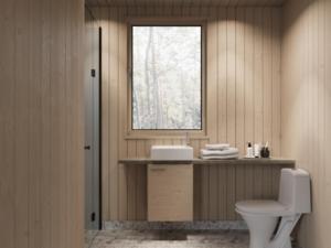 a bathroom with a sink and a toilet and a window at Villa Virpi in Rovaniemi +42 photos