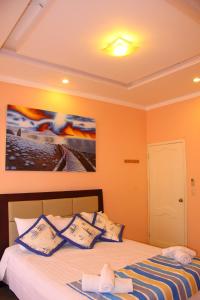 Postel nebo postele na pokoji v ubytování Hostal Duncan