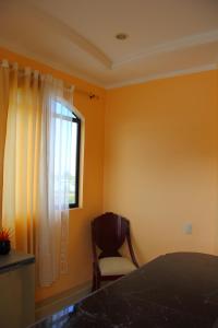 Postel nebo postele na pokoji v ubytování Hostal Duncan
