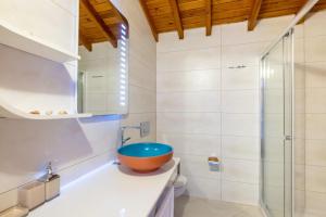 a bathroom with a bowl sink and a shower at Liman Pansiyon Palamutbükü in Datca +133 photos