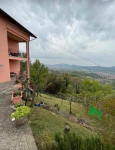 a house on a hill with a view at Il Bunker in Bolano