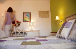 Posteľ alebo postele v izbe v ubytovaní Hostal Los Pinos