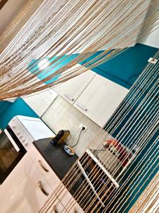 an aerial view of a kitchen with a bird cage at Ama Collection Esclusive Spa Ariosto in Ferrara