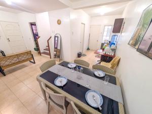a dining room with a table and chairs at Panglao 4 Bedroom Family and Group House With Pool in Dauis +26 photos
