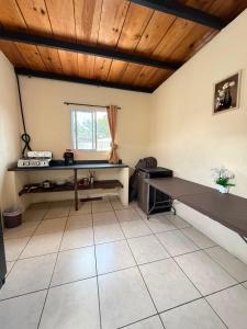 a living room with a ping pong table at Cristales de Antigua Casa Cristal in Antigua Guatemala