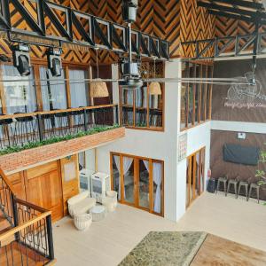 an inside view of a large building with a balcony at Dayunan in Bacolod