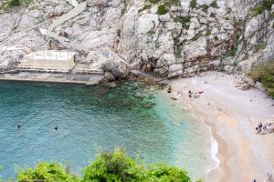 an aerial view of a beach next to a cliff at Apartment Dubcic: For perfect vacation in Dubrovnik
