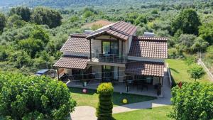 an aerial view of a house with a garden at Aelia Studios in Skala Potamias