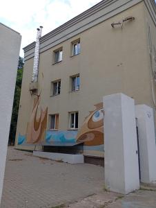 a building with a painting of a dog on it at Potemkin view suites in Odesa
