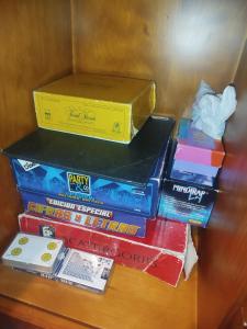 a pile of boxes sitting on top of a table at Brisa&Mar, con Posibilidad de Parking in Chipiona +10 photos