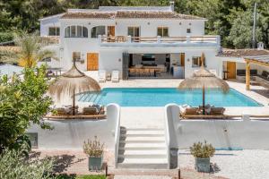 an image of a villa with a swimming pool at Casa Lou Lou JAVEA in Benitachell