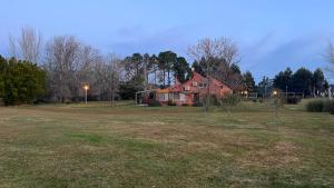 a house in the middle of a field at Casa de campo en Punta Ballena in Punta del Este