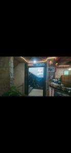 a room with a television with a video game on it at مرقد الاخلاص in Fort de lʼEau
