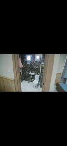 a view of a bathroom with a toilet in a room at مرقد الاخلاص in Fort de lʼEau