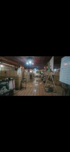a large room with a wooden floor in a building at مرقد الاخلاص in Fort de lʼEau