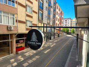 a sign for a corner park outside of a building at Corner Park Suites City Center Corlu in Çorlu