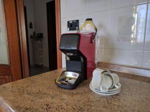 a toaster sitting on top of a kitchen counter at Residenza Nonna Lucia in Roccaforte Mondovì