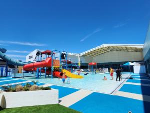 a water park with people playing in the water at Spacious accomodation 188 Unity Beach sleeps 6 Centrally located Pet friendly Pets Stay Free in Brean