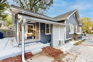 a small house with a whitepipe at Easy Access to OSU! 'Marvin's Manor' in Stillwater in Stillwater