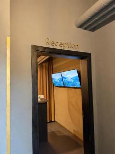 an elevator with a sign that reads reception at Chillout Hostel Zagreb in Zagreb +40 photos