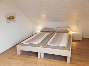 Postel nebo postele na pokoji v ubytování Gästehaus ALBA - garantiert Tickets für Rulantica und Europa Park über uns