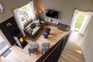 an overhead view of a living room with a fireplace at Traumnest Eifel mit Sauna & Whirlpool in Monschau