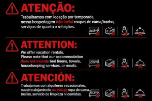 a sign that says attention with red symbols on it at Loft moderno próximo a Praia Grande e Centro Turístico in Ubatuba