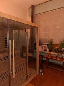 a room with a glass door with a dog in it at B&B Villa D'Hondt in Blankenberge +62 photos