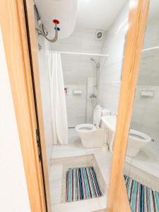 a bathroom with a toilet and a sink at Gorštak in Žabljak +37 photos