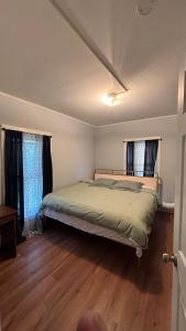 a bedroom with a bed in a room at Cozy Oneonta Getaway in Oneonta