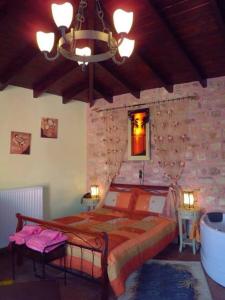 Arhontiko Kordopati Traditional Guesthouse tesisinde bir odada yatak veya yataklar