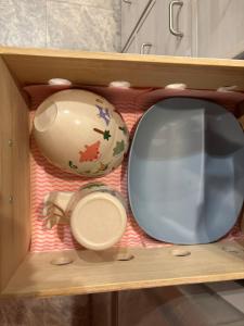 a wooden box with a tv and a vase at Sea Retreat Nika in Kawazu +55 photos