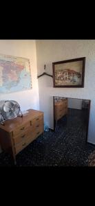 a room with two dressers and a picture on the wall at Leydi 2 in Alicante