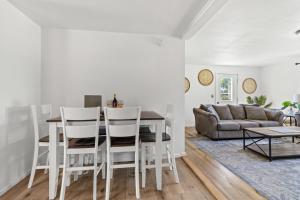 a kitchen and living room with a table and chairs at Riverview Bliss in Beautiful Home in Pulaski