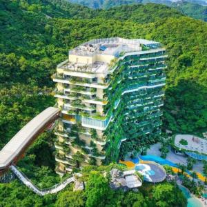 an aerial view of a building with a resort at 1404, Building 1, Ocean Sky Forest - Flamingo Cat Ba in Cat Ba