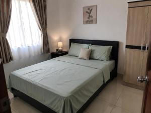 a bedroom with a large bed in a room at GORDITAS Villa in Zacatecas