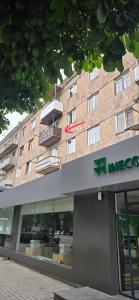a building with a red frisbee on top of it at Avenue B&B in Vanadzor