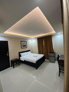 Krevet ili kreveti u jedinici u okviru objekta Weber Hotel