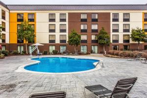 a swimming pool in front of a building at Comfort Inn Fort Mill Amusement Park at Carowinds Blvd in Fort Mill